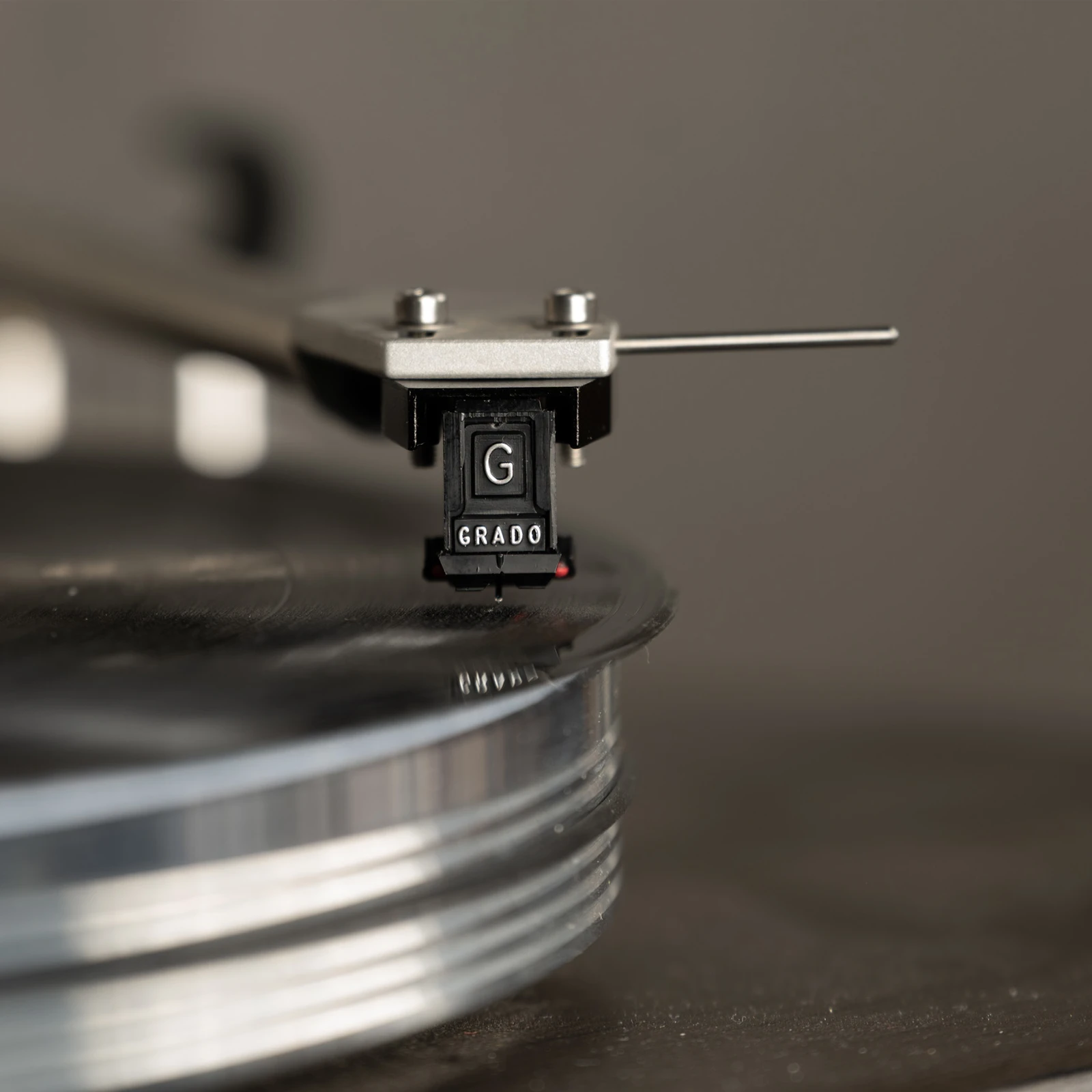 Grado Red4 P-Mount cartridge installed in a T4P tonearm slot, stylus guard removed