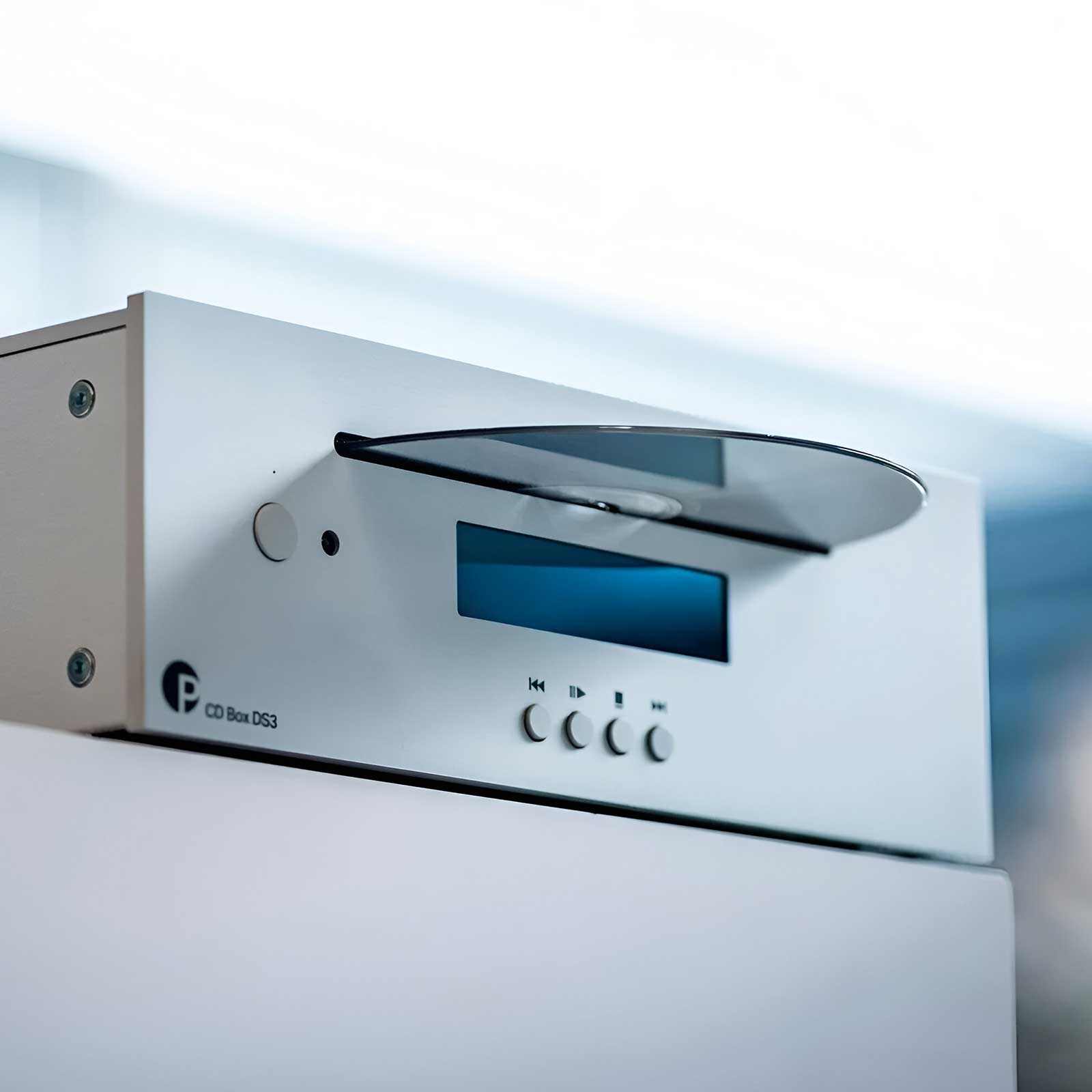 Lifestyle of the bottom angled view of the Pro-Ject CD Box DS3 CD Player in Silver with CD