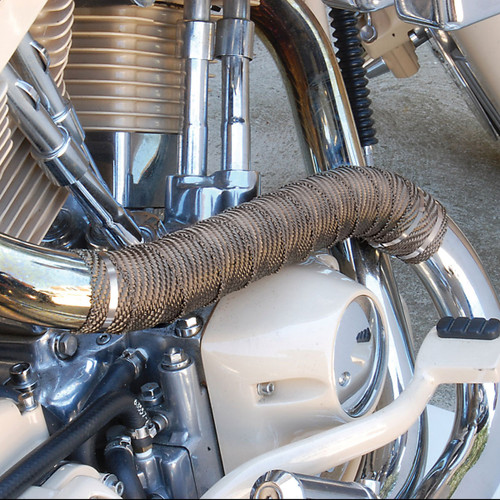 Titanium exhaust wrap installed on motorcycle