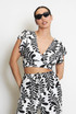 Leaf Print Open Back Frilled Blouse
