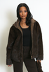 Faux Fur Hooded Jacket With Cable Look Hem