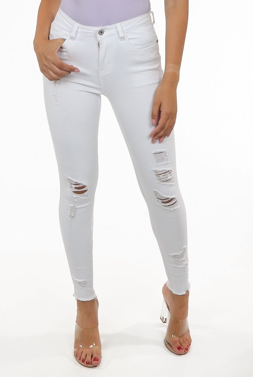 white denim jeans ripped