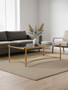 Ackley Gold Coffee Table with Black Glass