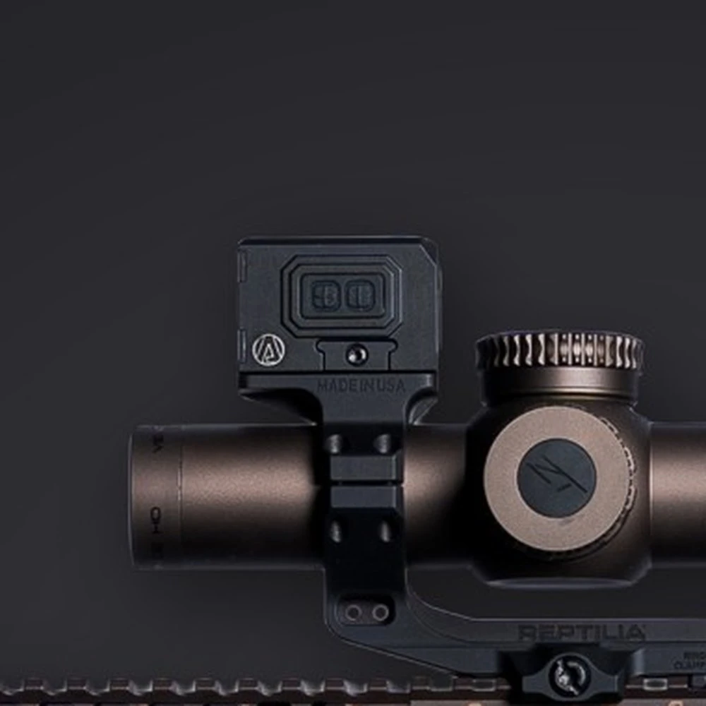 Atibal Solar Tactical Dot reflex sight mounted above the scope