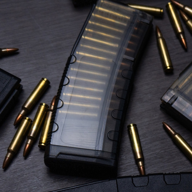 Translucent Amend2 MOD-C polycarbonate AR-15 magazine with visible rounds