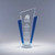 8.5" x 5" x 3.25" or 10" x 5" x 3.25" Impact optic crystal award with clear and blue design on pedestal base.