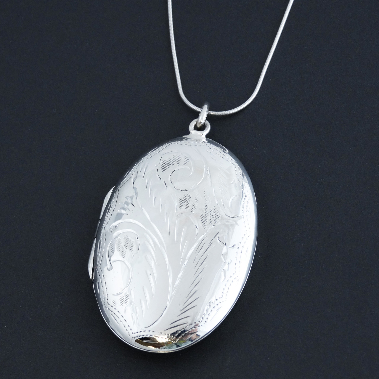Sterling Silver Oval Photo Locket Necklace FashionJunkie4Life sterling-silver-oval-photo-locket-necklace-fashionjunkie4life