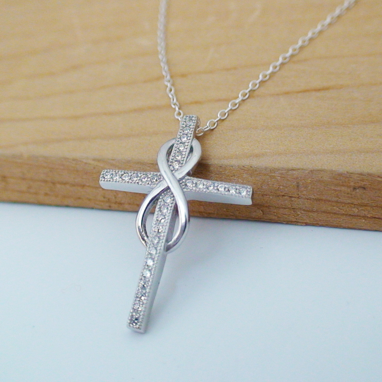 Sterling silver infinity sales cross necklace