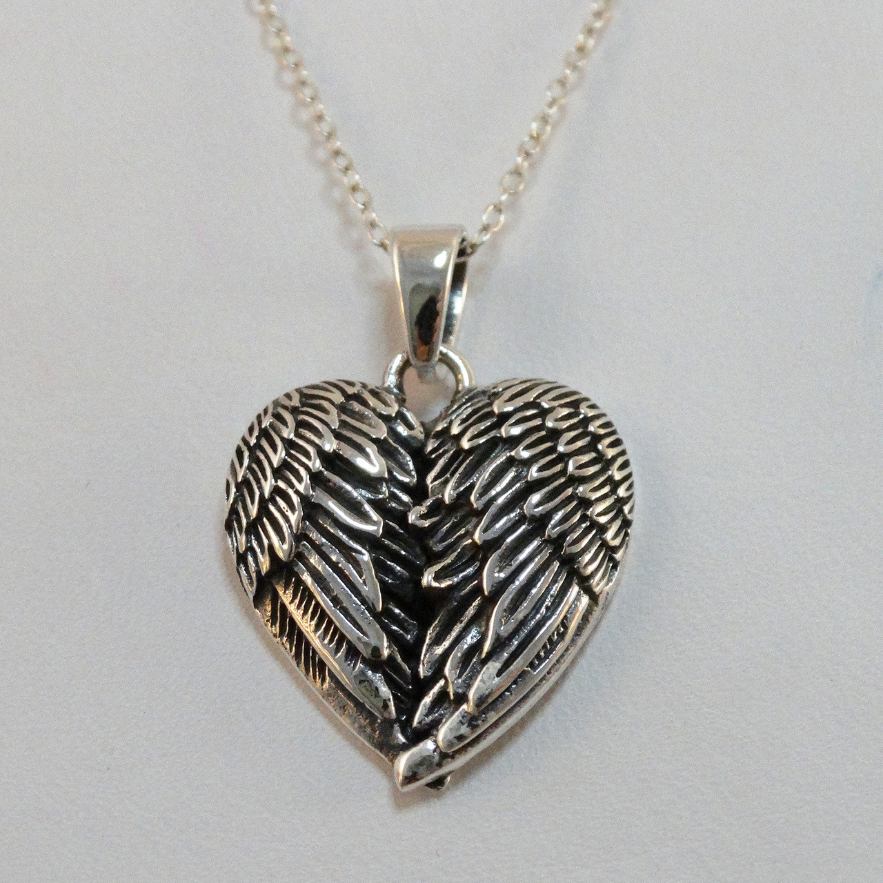 Picture pendant necklace with wings clearance