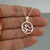 Two Ocean Waves in Circle Pendant Necklace - Sterling Silver
