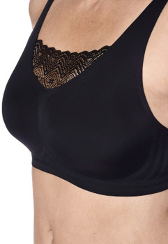 Side profile of the Amoena Esra pocketed bra, showing the wide side panels and invisible bilateral pockets for secure breast form placement