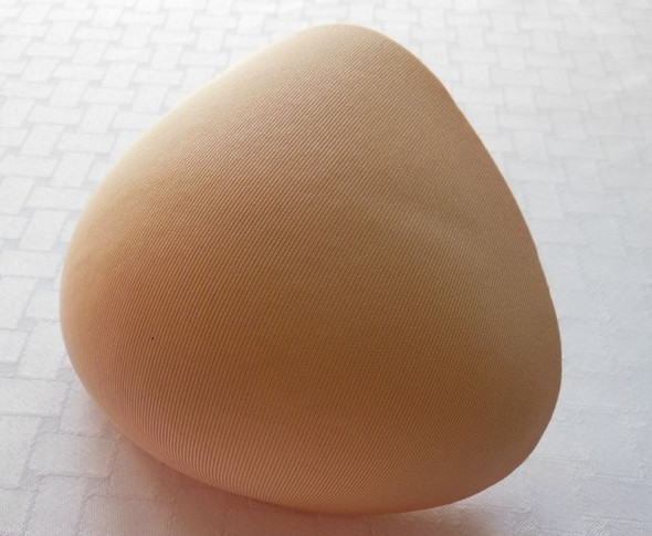 Nearly Me Foam Breast Form, Foam Breast Prosthesis
For use for After  breast Surgery 
Shape -Triangle | Color-Beige

Nearly Me Foam Breast Form