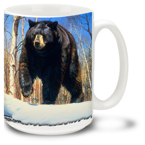 This powerful majestic Bear is on the hunt against a snowy backdrop.