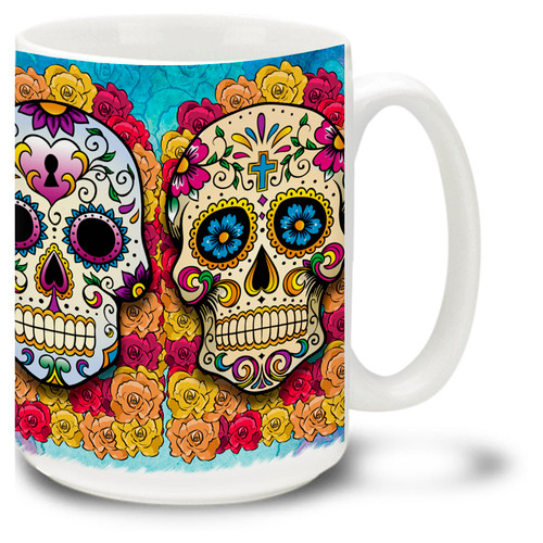 Celebrate the Day of the Dead all year long with this vibrant and colorful sugar skull mug with four different skulls!