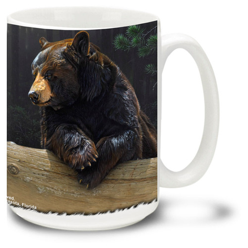 An American black bear enjoys a relaxing break in the wilderness on this black bear coffee mug. 15oz Bear Mug is dishwasher and microwave safe.