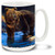 This mighty bear is looking for fish by the river's edge.
