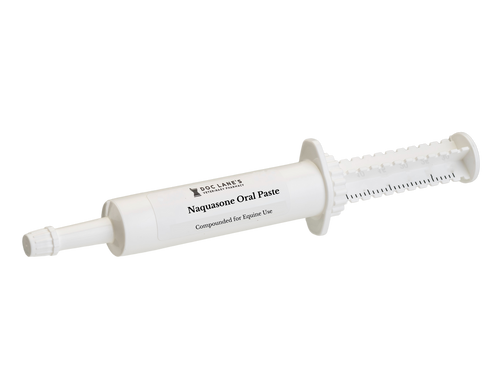 A tube of Naquasone Oral Paste for veterinary use.