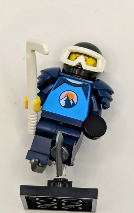 CTY1682 LEGO® Ice Hockey Player - Male, Dark Azure and Dark Blue Shirt with Mountains, Dark Blue Legs and Shoulder Pads, Black Helmet, White Goggles, Ice Skates