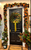 Beautiful magnolia leaf wreath crafted from fresh magnolia foliage, featuring glossy green leaves and velvety brown undersides for a natural, full appearance that adds classic Southern charm to front doors, entryways, and seasonal home decor.
