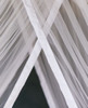 Overlapping panels at the opening of a polyester round mosquito net