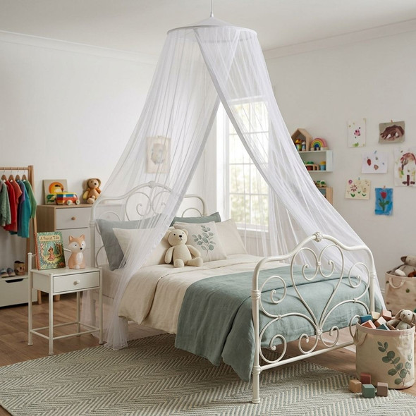 Sheer polyester round mosquito net over a single bed in a child's bedroom