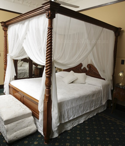 Silk mosquito net on poster bed