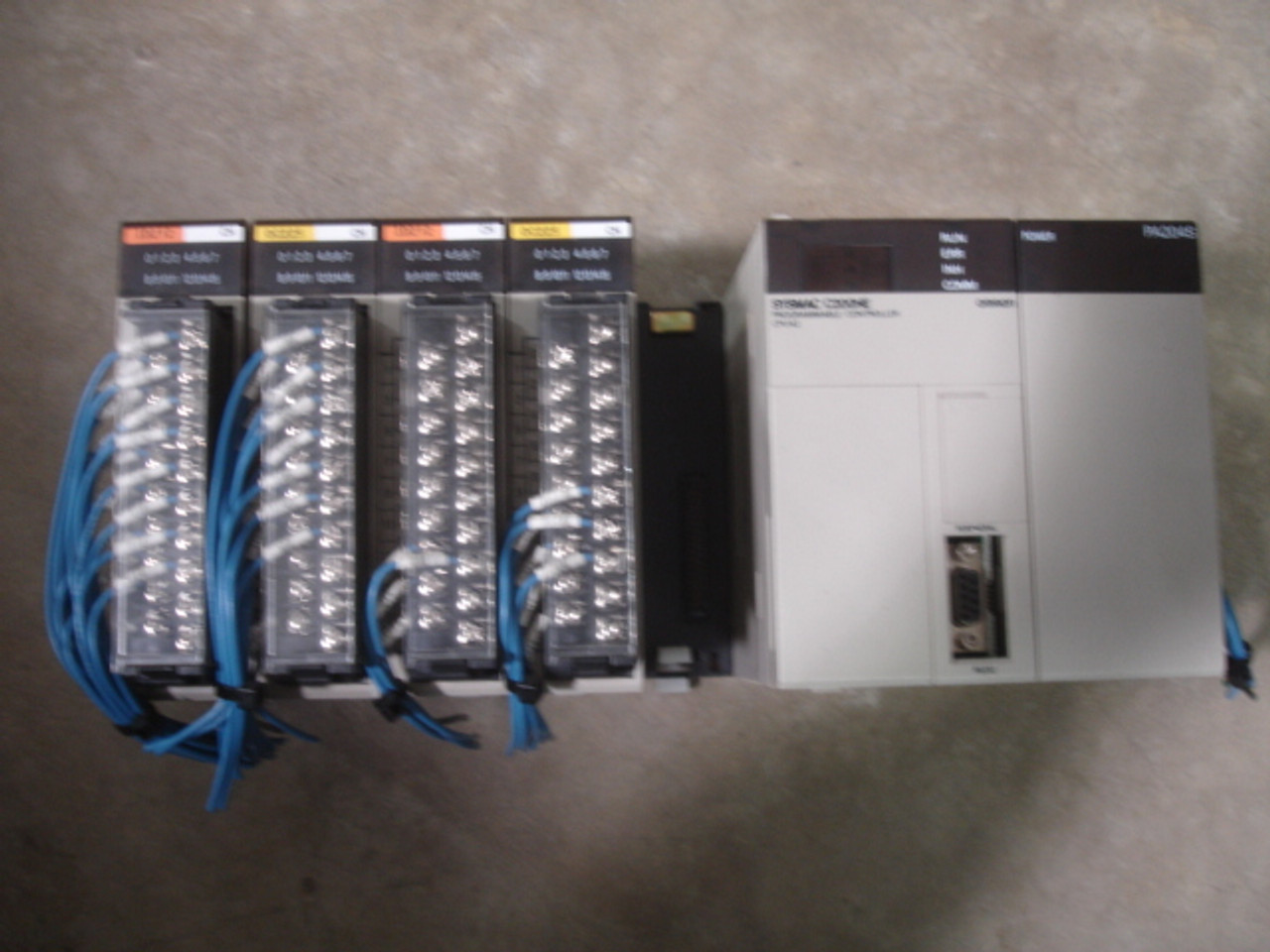 Omron C200HE-4 C200HE-CPU42-E CPU unit w/(2)C200H-OC225 250VAC/24VDC 2A/P 8A/U Output units, (2) 200H-ID212 24VDC 7mA input units, PA205S Power Supply Unit, C200HW-BC051 Base Unit