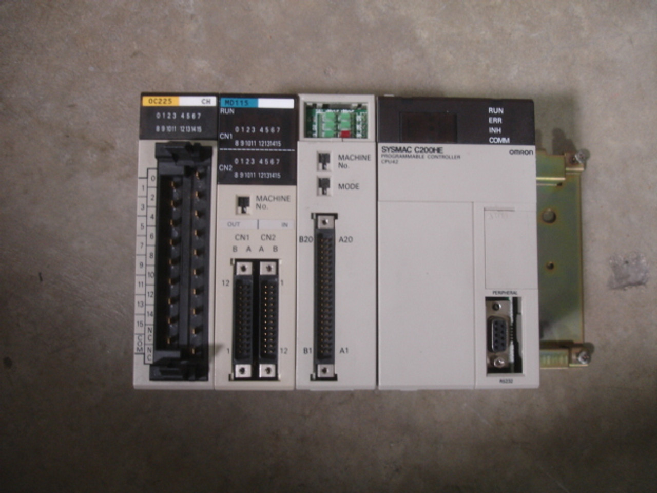 Omron OmronC200HE-1 C200HE-CPU42-E CPU unit w/C200H-NC112 NC Unit, C200H-OC225 250V AV/24VDC, 2A/P, 8A/U Output Unit, C200H-MP115 12VDC 4.1mA 16 Points input output unit, C200HW-BC031 Base Unit