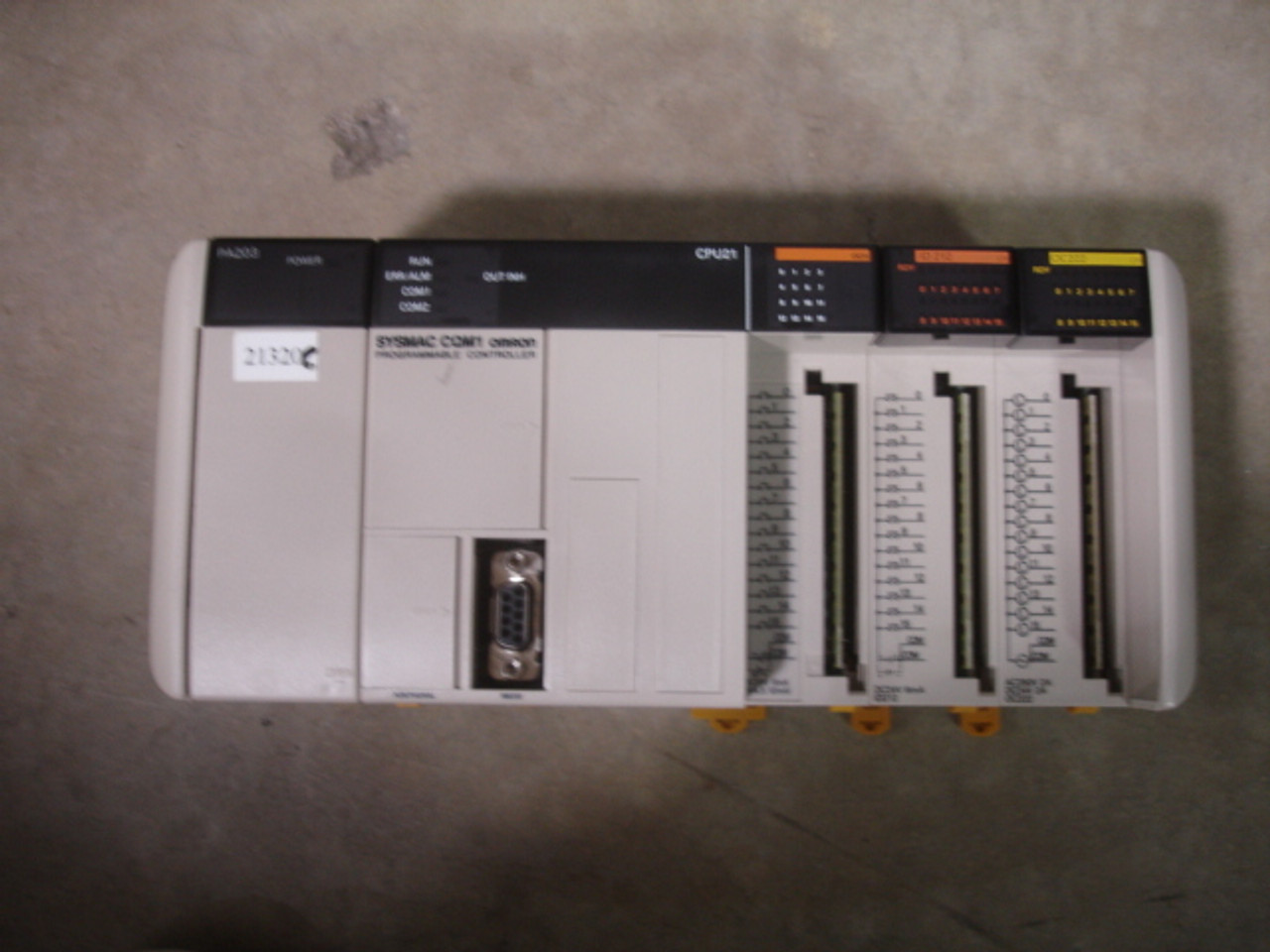 Omron OmronCQM1 CQM1-CPU11-E 24VDV, 10mA, 16 Points CPU Unit w/CQM1-PA203 100-240VAC, 50/60Hz, 60VA Power Supply Unit, (2) CQM1-OC221 250VAC Output units, CQM1-ID212 24VDC, 6mA, 16 Points Input Unit