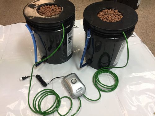 2 Plant Complete DWC Buckets Including: Quality Airpump, Airstones, Water Level Indicator Kits, Clay Rocks And 4 Rockwool Starter Plugs Drilled And Ready.