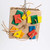 366092-chunky-shredding-block-parrot-toy