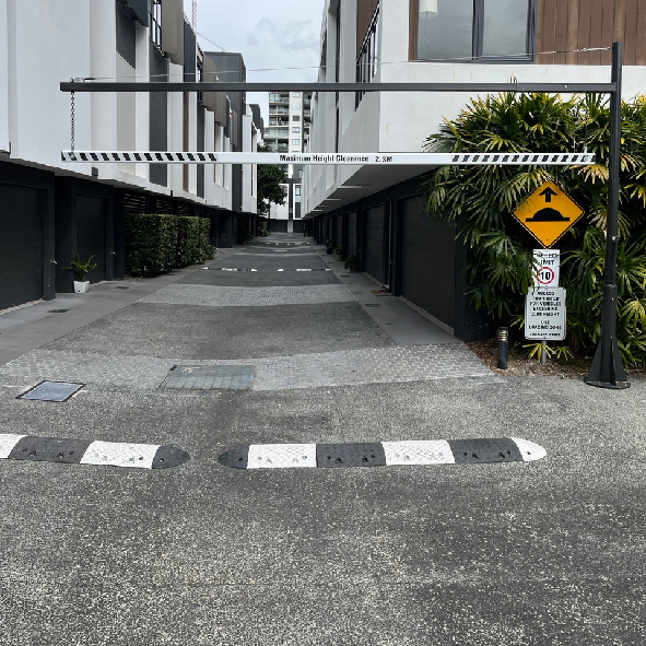 How Did Manhattan Body Corp Prevent Oversized Vehicle Damage in a Residential Strata Driveway?