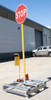 Truck control pallet with portable wheel chock
