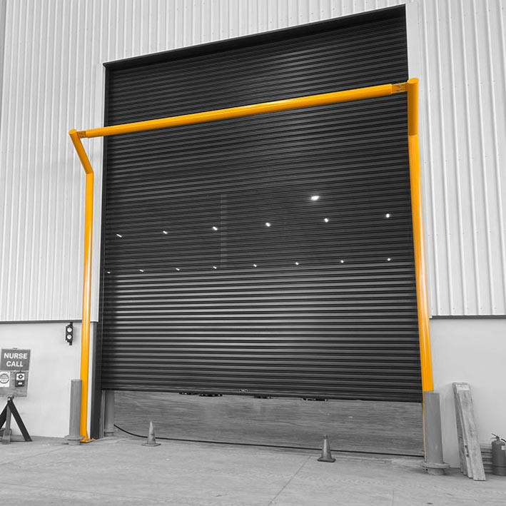 Warehouse roller door protection frame