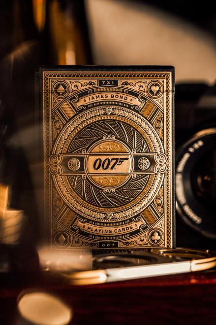 Gold, black front of packaging for  James Bond Playing Cards–theory11 