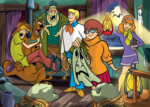Close up of Scooby Doo: The Unmasking , Velma holding the mask while the team reacts