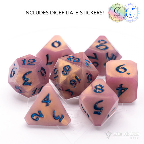 Cynfully Lux Dice Set- a tan shimmery pink dice set with glitter navy blue numbers 