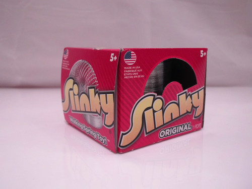 Slinky Original front of packaging, traditional red and yellow cube