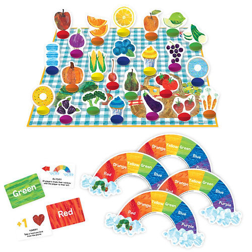 The game components featuring a picnic blanket full of various food and 4 player rainbow cards