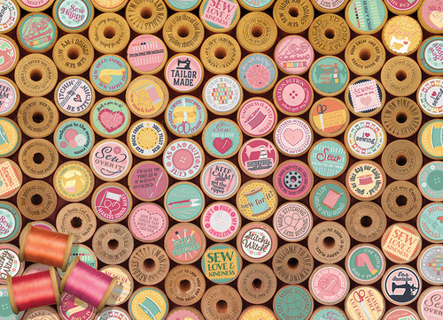 Sew Happy tops of thread spools forming a heart pattern puzzle image