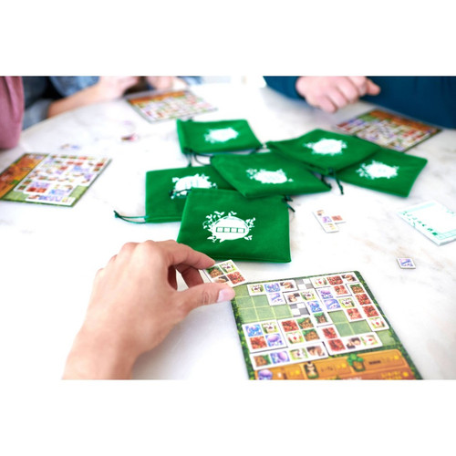 A player adds a tile to their board