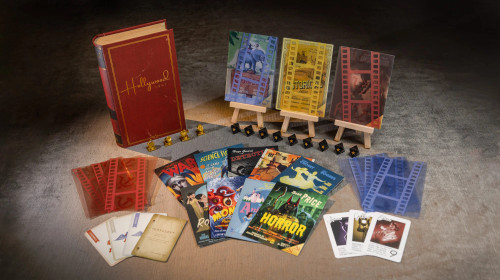 Hollywood 1947 game components, including 8-sided dice, movie poster genre cards and wooden easels