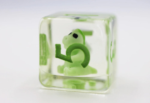 Close up of Baby T-Rex six-sided die