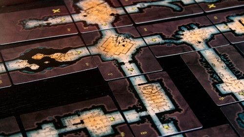 Dungenerator map cards laid out adjacent to create a dungeon