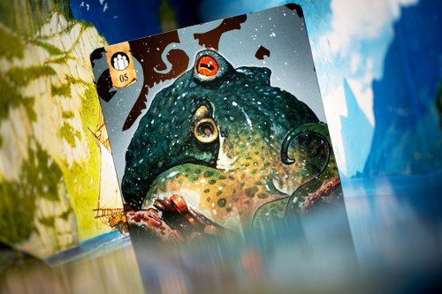 Closeup of card showing a sea monster
