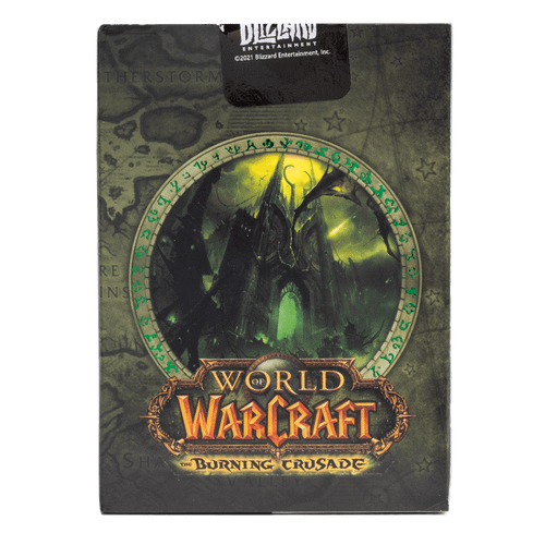 back of product packaging featuring a  castle with darkness and green fire around it. 