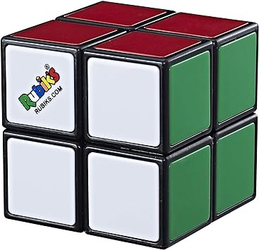 cube displaying white, red and green sides 