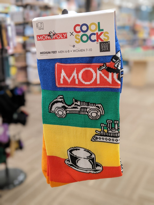 Monopoly piece graphic socks on a hangar