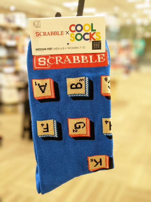 Scrabble tile graphic socks on a hangar