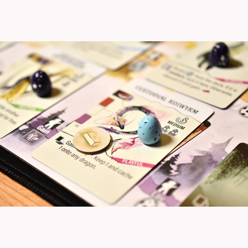 Closeup of a card with an egg token on it